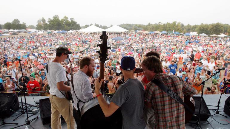 A blue grass band entertains the crowd at ROMP Festival in Owensboro, Kentucky A blue grass band entertains the crowd at ROMP Festival in Owensboro, Kentucky
