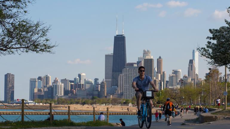 Biking alongside Lake Michigan on a spring day in Lincoln Park Biking alongside Lake Michigan on a spring day in Lincoln Park