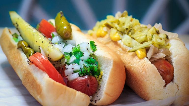Hot dogs with a variety of toppings at Taste of Chicago, including the signature Chicago dog Hot dogs with a variety of toppings at Taste of Chicago, including the signature Chicago dog