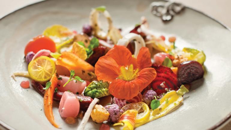 Artisanal beet salad garnished with an apple blossom Artisanal beet salad garnished with an apple blossom