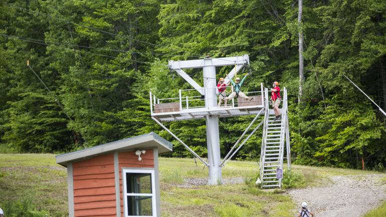 Lively start along the zip lining course in Sunday River Ski Resort Lively start along the zip lining course in Sunday River Ski Resort