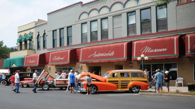 Classic cars line the entrance of the Pontiac-Oakland Automobile Museum Classic cars line the entrance of the Pontiac-Oakland Automobile Museum