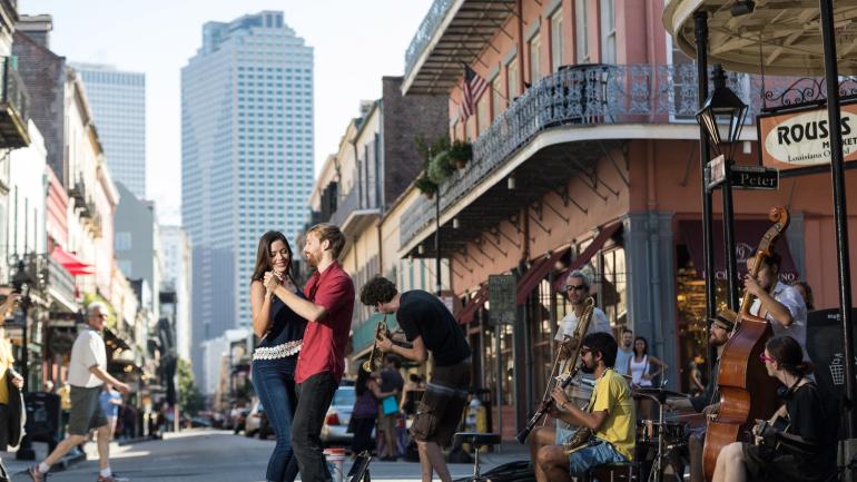Dancing to street busker rhythms in New Orleans Dancing to street busker rhythms in New Orleans