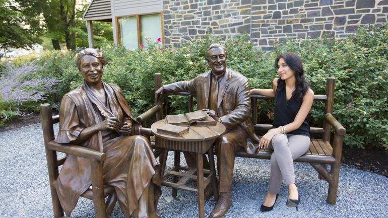 Posing with statues of Franklin Delano Roosevelt and his wife Eleanor in Hyde Park, New York Posing with statues of Franklin Delano Roosevelt and his wife Eleanor in Hyde Park, New York