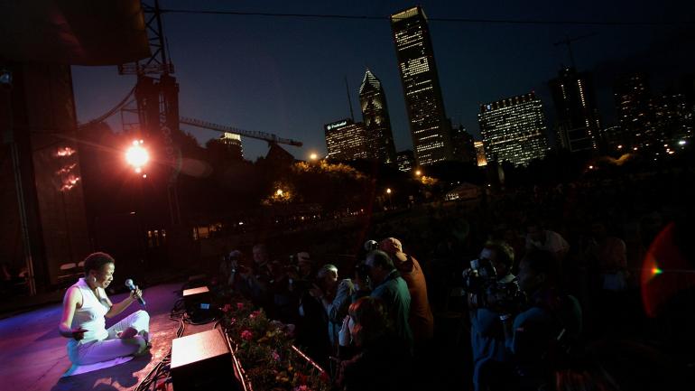 A moment on the Chicago Blues Festival stage with the city skyline as a backdrop A moment on the Chicago Blues Festival stage with the city skyline as a backdrop