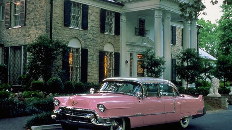Elvis Presley’s pink Cadillac parked in front of the Graceland mansion in Mempis, Tennessee Elvis Presley’s pink Cadillac parked in front of the Graceland mansion in Mempis, Tennessee