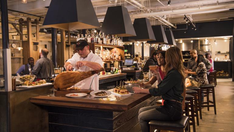 At La Cuchara, patrons can enjoy Basque-inspired tapas while the chef carves an Iberian ham At La Cuchara, patrons can enjoy Basque-inspired tapas while the chef carves an Iberian ham