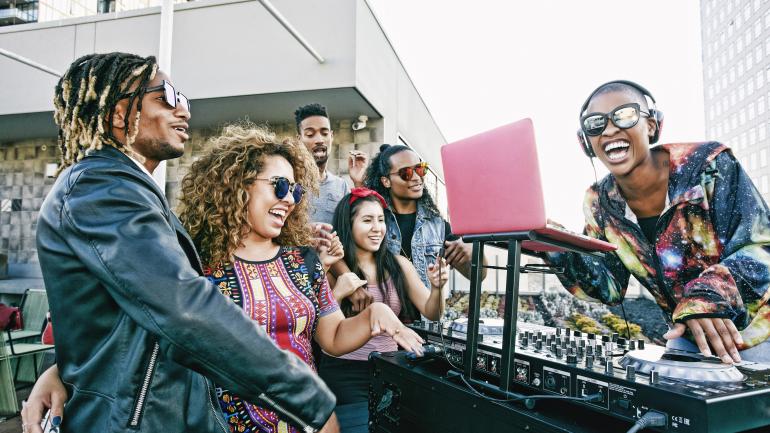 Listening to a DJ on a Los Angeles rooftop Listening to a DJ on a Los Angeles rooftop