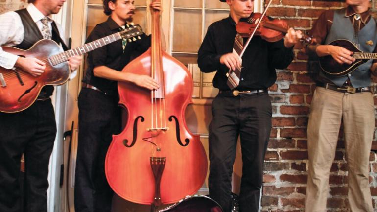 A quartet performing in the French Quarter in New Orleans A quartet performing in the French Quarter in New Orleans