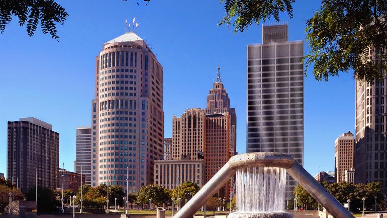 Serene park and the city skyline in downtown Detroit Serene park and the city skyline in downtown Detroit
