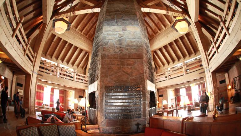 The impressive Timberline Lodge lobby fireplace serves as an ideal gathering spot The impressive Timberline Lodge lobby fireplace serves as an ideal gathering spot