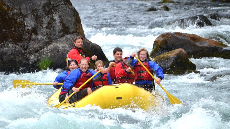 Family fun on a rafting trip cascading down the McKenzie River Family fun on a rafting trip cascading down the McKenzie River
