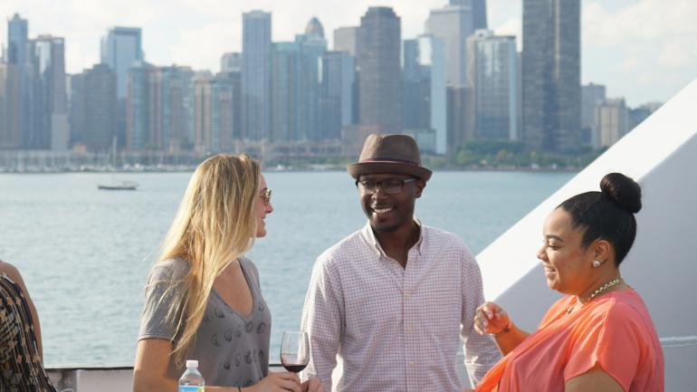 Sharing a moment over wine aboard the Odyssey Lake Michigan Sharing a moment over wine aboard the Odyssey Lake Michigan