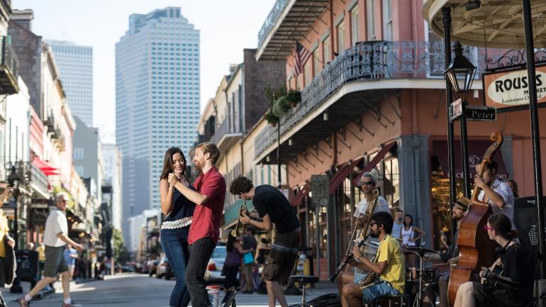 Dancing in the street as buskers play in New Orleans, Louisiana Dancing in the street as buskers play in New Orleans, Louisiana