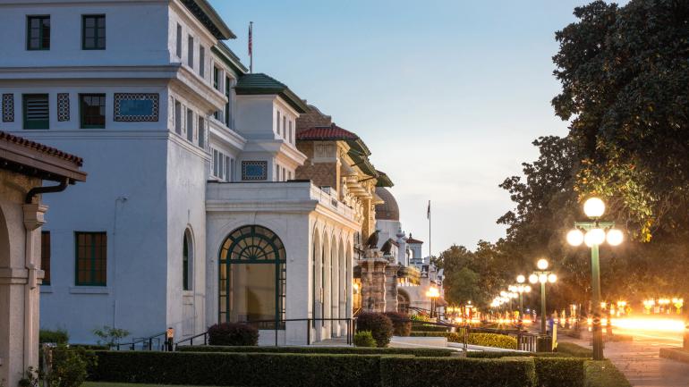 A twilight view of the ornate bathhouses on Hot Springs’ Bathhouse Row A twilight view of the ornate bathhouses on Hot Springs’ Bathhouse Row