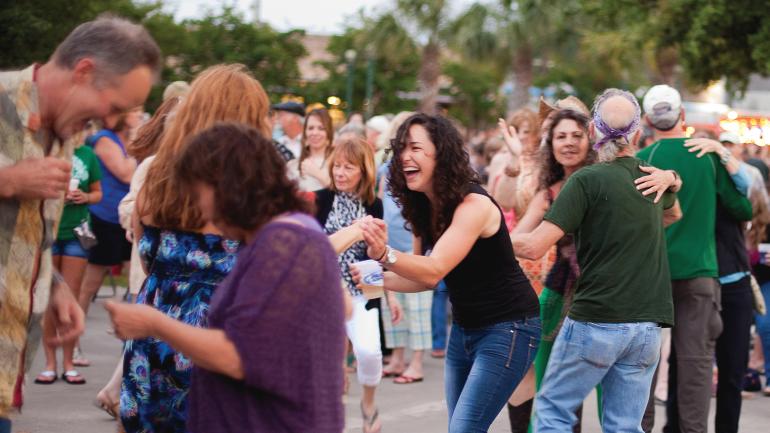 Dancing to live music at a Lafayette, Louisiana, street festival Dancing to live music at a Lafayette, Louisiana, street festival