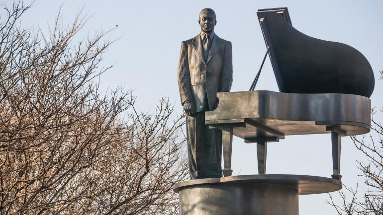 A statue of pianist and orchestra leader Duke Ellington in Harlem in New York City A statue of pianist and orchestra leader Duke Ellington in Harlem in New York City