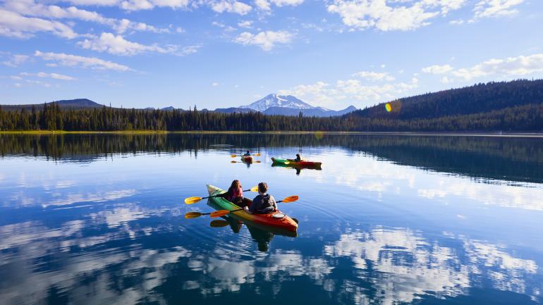 Kayaking on Elk Lake with mountain views Kayaking on Elk Lake with mountain views
