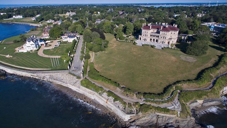 Aerial view of the dramatic scenery and majestic mansions of the Cliff Walk Aerial view of the dramatic scenery and majestic mansions of the Cliff Walk