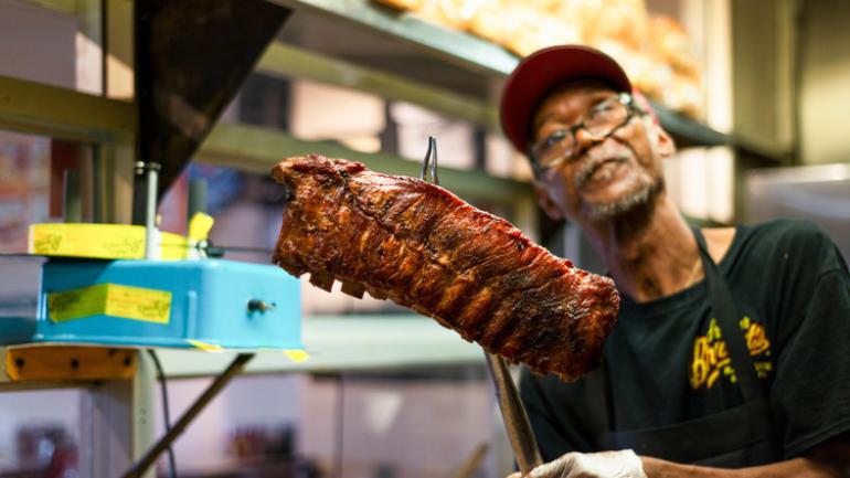 cook with meat at Arthur Bryant's cook with meat at Arthur Bryant's