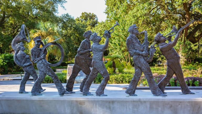 A sculpture celebrating street musicians in the Roots of Music Cultural Sculpture Garden in New Orleans' Louis Armstrong Park A sculpture celebrating street musicians in the Roots of Music Cultural Sculpture Garden in New Orleans' Louis Armstrong Park