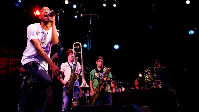 Trombone Shorty & Orleans Avenue performing on stage during Bumbershoot, a music festival in Seattle Trombone Shorty & Orleans Avenue performing on stage during Bumbershoot, a music festival in Seattle