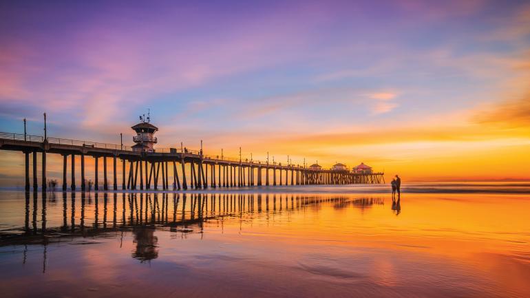 A breathtaking sunset as seen from the beach near the Huntington Beach Pier A breathtaking sunset as seen from the beach near the Huntington Beach Pier