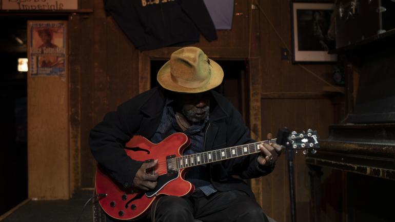 An intimate performance of Chicago blues music An intimate performance of Chicago blues music