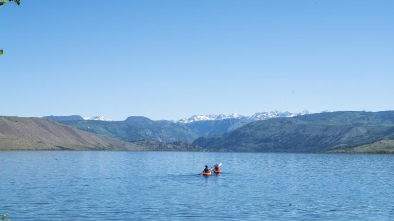 Kayaking on pristine Fremont Lake in Pinedale, Wyoming Kayaking on pristine Fremont Lake in Pinedale, Wyoming