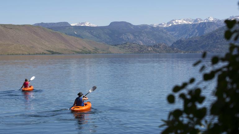 Kayaking on Fremont Lake in Pinedale, Wyoming Kayaking on Fremont Lake in Pinedale, Wyoming