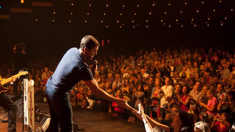 Country music singer Josh Turner greets fans while performing at the historic Grand Ole Opry Country music singer Josh Turner greets fans while performing at the historic Grand Ole Opry