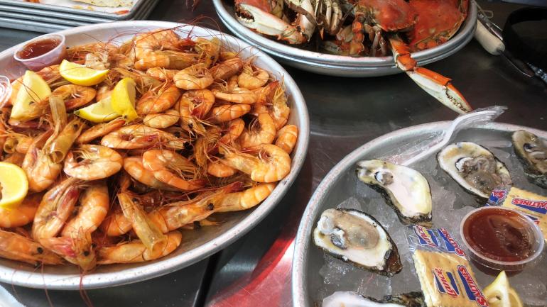 Platters of fresh shrimp, oysters and crab from Kenney Seafood Market Platters of fresh shrimp, oysters and crab from Kenney Seafood Market