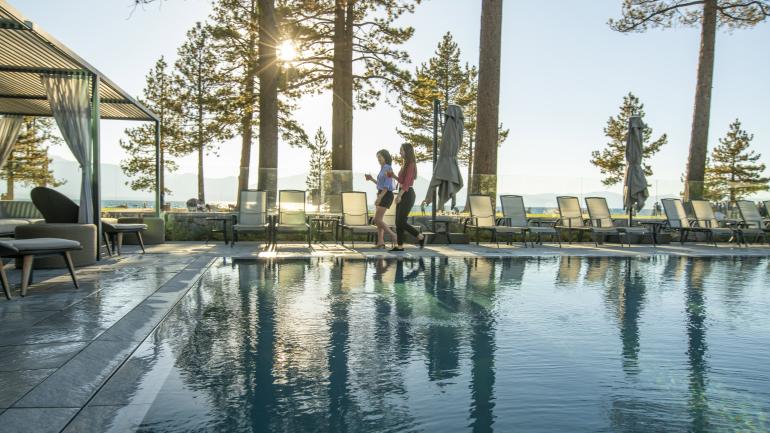 Sipping cocktails by the pool at Edgewood Tahoe resort Sipping cocktails by the pool at Edgewood Tahoe resort