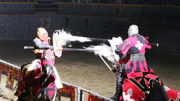 A jousting scene at the Medieval Times dinner show A jousting scene at the Medieval Times dinner show