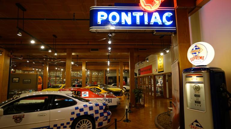Classic cars on display among other memorabilia in the Pontiac-Oakland Automobile Museum Classic cars on display among other memorabilia in the Pontiac-Oakland Automobile Museum