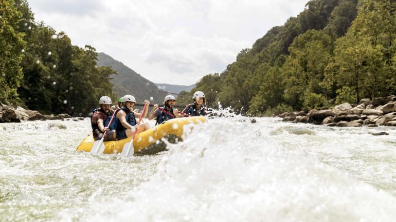 Braving the rapids on a rafting trip down the New River Gorge Braving the rapids on a rafting trip down the New River Gorge