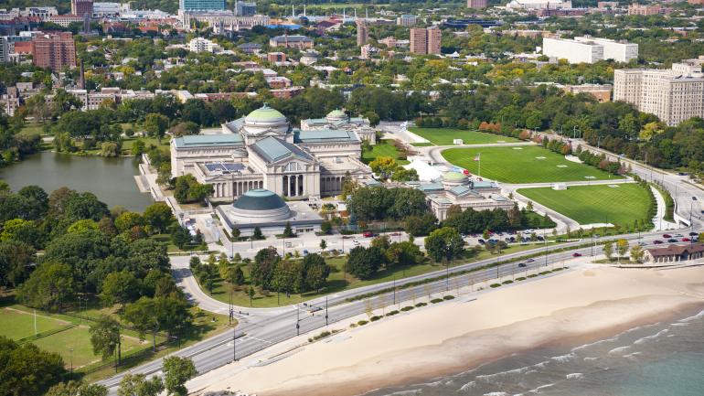 Aerial view of the Museum of Science and Industry alongside the Lake Michigan shoreline Aerial view of the Museum of Science and Industry alongside the Lake Michigan shoreline