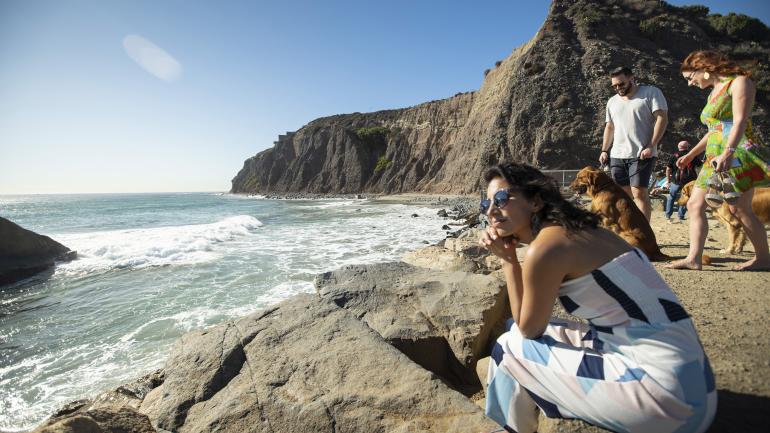 Relaxing on the beach at Dana Point Headlands Conservation Area in California Relaxing on the beach at Dana Point Headlands Conservation Area in California