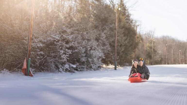 Sledding along a perfect patch of snow Sledding along a perfect patch of snow