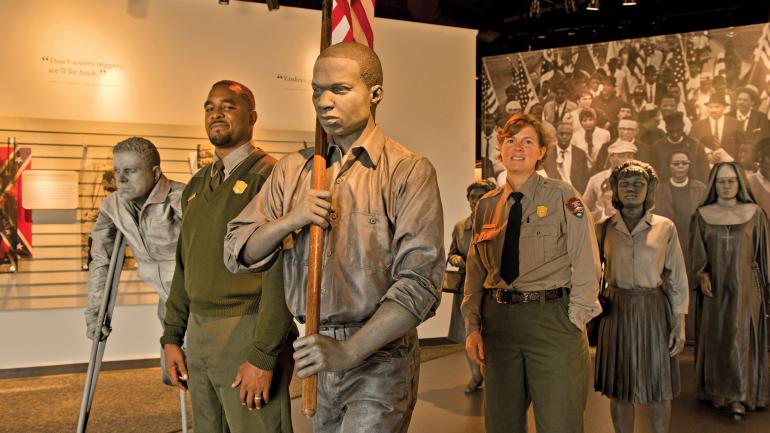 Park rangers demonstrating an immersive exhibit at the Selma-to-Montgomery March Lowndes County Interpretive Center Park rangers demonstrating an immersive exhibit at the Selma-to-Montgomery March Lowndes County Interpretive Center