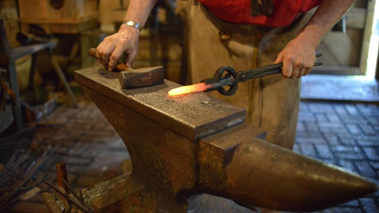Blacksmith demonstration at the Heritage Farm Museum and Village in Huntington, West Virginia Blacksmith demonstration at the Heritage Farm Museum and Village in Huntington, West Virginia