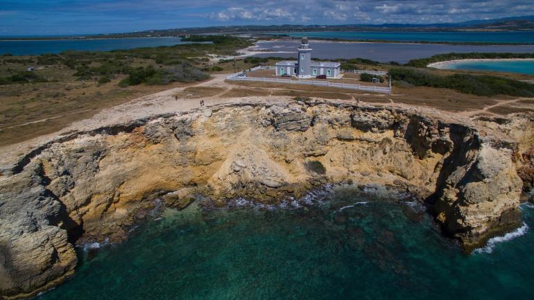 Los Morrillos Lighthouse perched on an oceanside cliff in Cabo Rojo National Wildlife Refuge Los Morrillos Lighthouse perched on an oceanside cliff in Cabo Rojo National Wildlife Refuge
