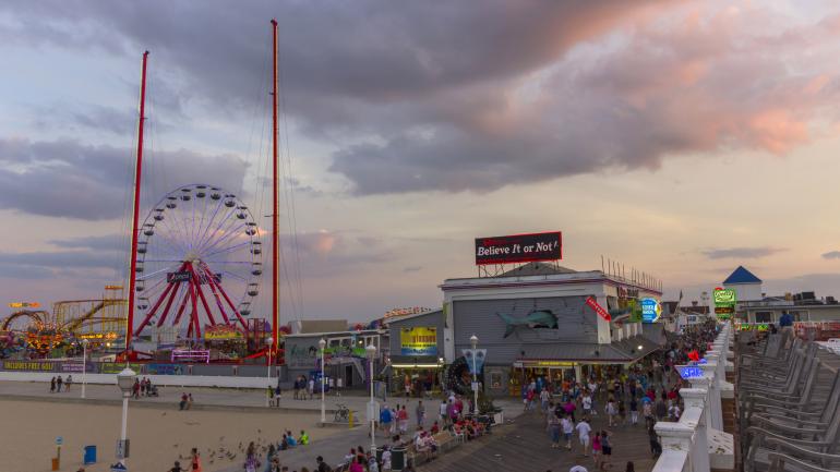 Stroll the bustling beachfront boardwalk of Ocean City, Maryland. Stroll the bustling beachfront boardwalk of Ocean City, Maryland.