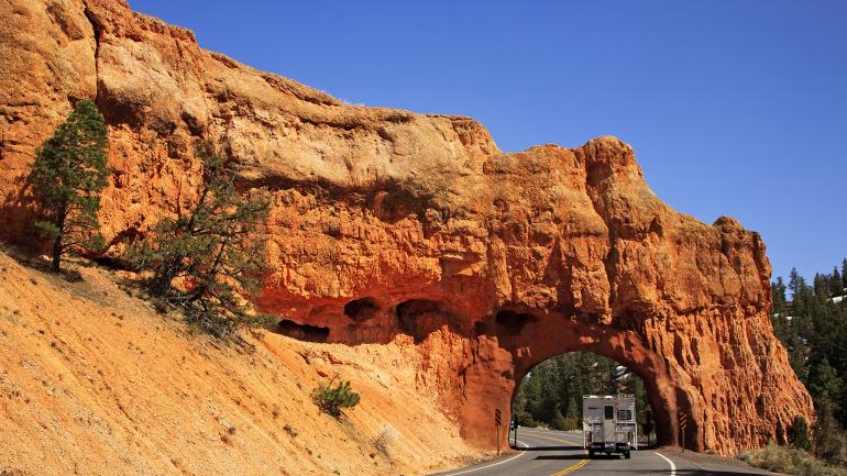 Tunnel through Red Canyon on Scenic Byway 12 near Bryce Canyon National Park in Utah Tunnel through Red Canyon on Scenic Byway 12 near Bryce Canyon National Park in Utah