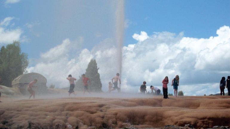 Kids playing in the Soda Springs Geyser in Idaho Kids playing in the Soda Springs Geyser in Idaho