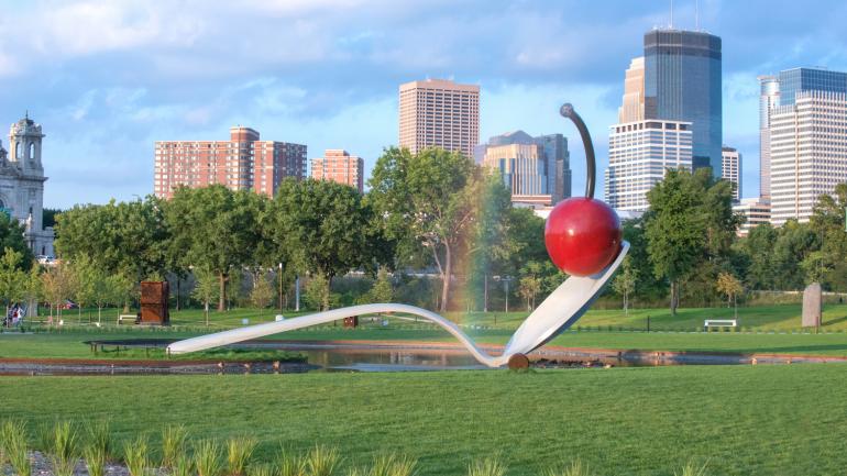 Spoonbridge and Cherry sculpture by Claes Oldenburg and Coosje van Bruggen in the Minneapolis Sculpture Garden in Minnesota Spoonbridge and Cherry sculpture by Claes Oldenburg and Coosje van Bruggen in the Minneapolis Sculpture Garden in Minnesota