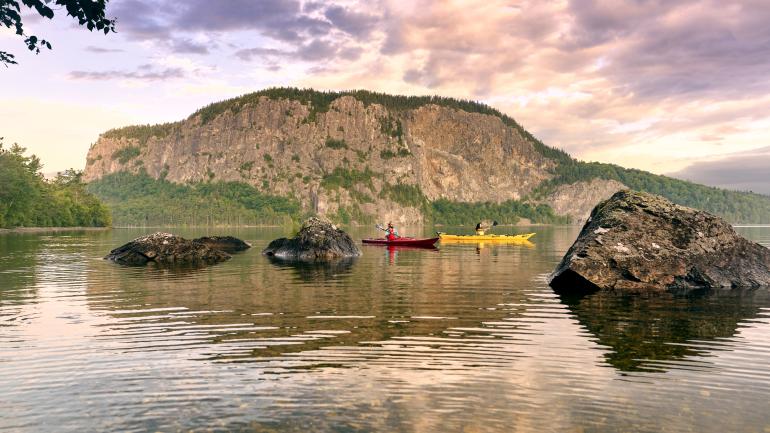Kayakers enjoying Moosehead Lake in Maine Kayakers enjoying Moosehead Lake in Maine