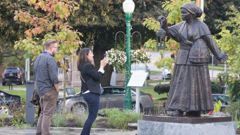 Photographing a statue of Harriet Tubman in Auburn, New York Photographing a statue of Harriet Tubman in Auburn, New York