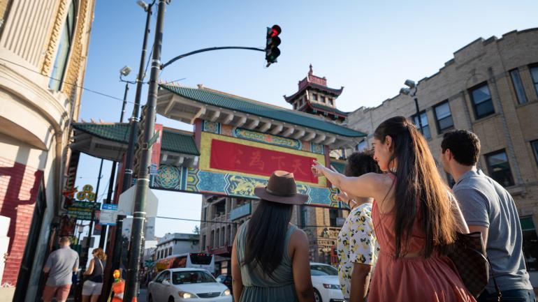 Visitors at the entrance of Chicago’s Chinatown neighborhood Visitors at the entrance of Chicago’s Chinatown neighborhood