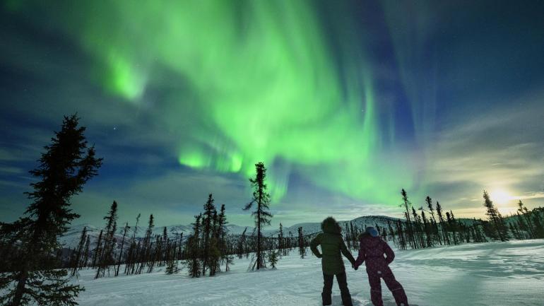 Gazing at the green glow of the northern lights in Fairbanks Gazing at the green glow of the northern lights in Fairbanks